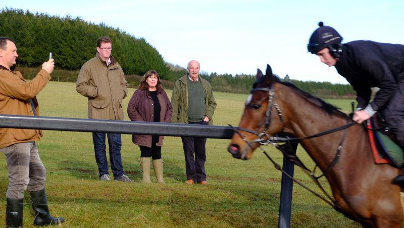Paul Simms filming while Dan, Julie and David watch their horse Charbel fly past
