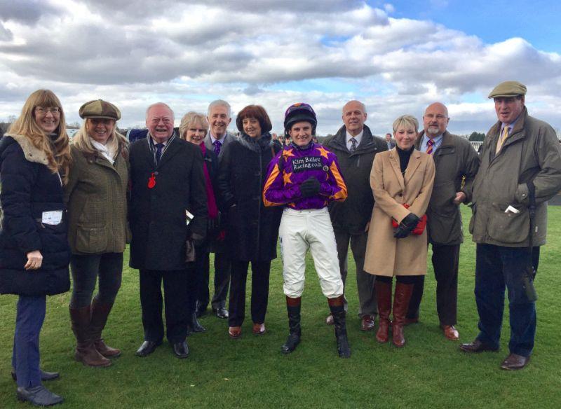 Members of the Robin Outlaws Partnership with their jockey Jamie Moore