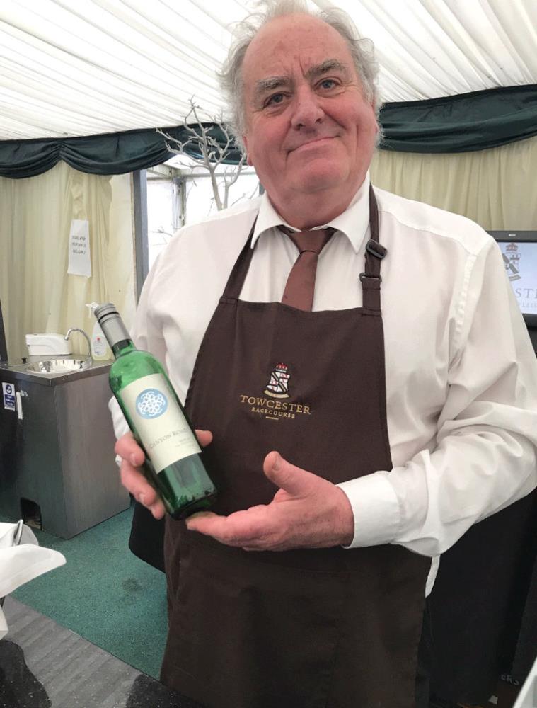 Towcester's own Sommelier and racings best barman as recognised by Nicky Henderson and others... Yes, Clive with a bottle of red wine!!?