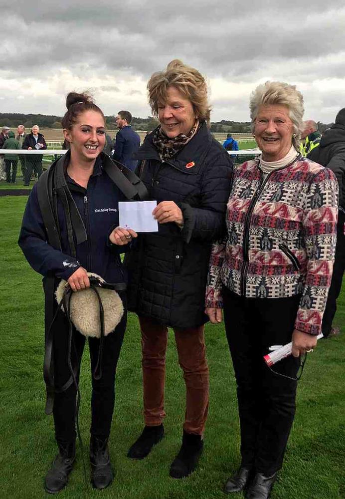 Stevie receiving her best turned out prize for Ben Arthur from Emma Higgin and Sue Clark
