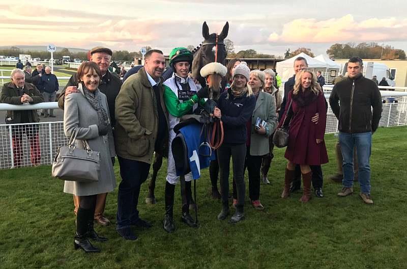 Happy team of owners with their winner Vinndication