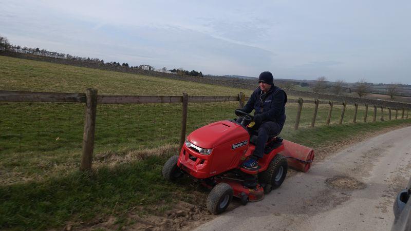 Mat mowing the drive..