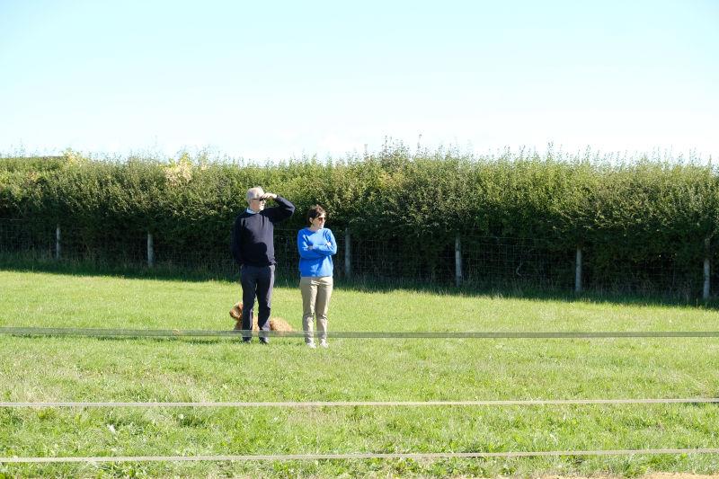 Mick and Helen Leonard watching the horses canter
