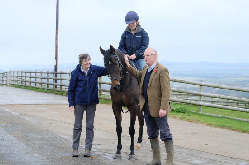 Melinda and Mark Laws with their horse Ben Arthur
