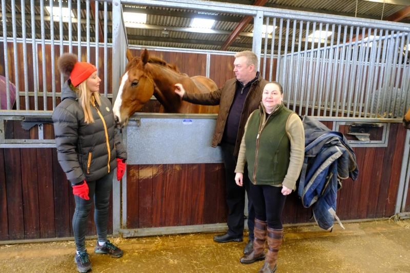 John and Mandy Battershall showing Carol their horse Lord Apparelli