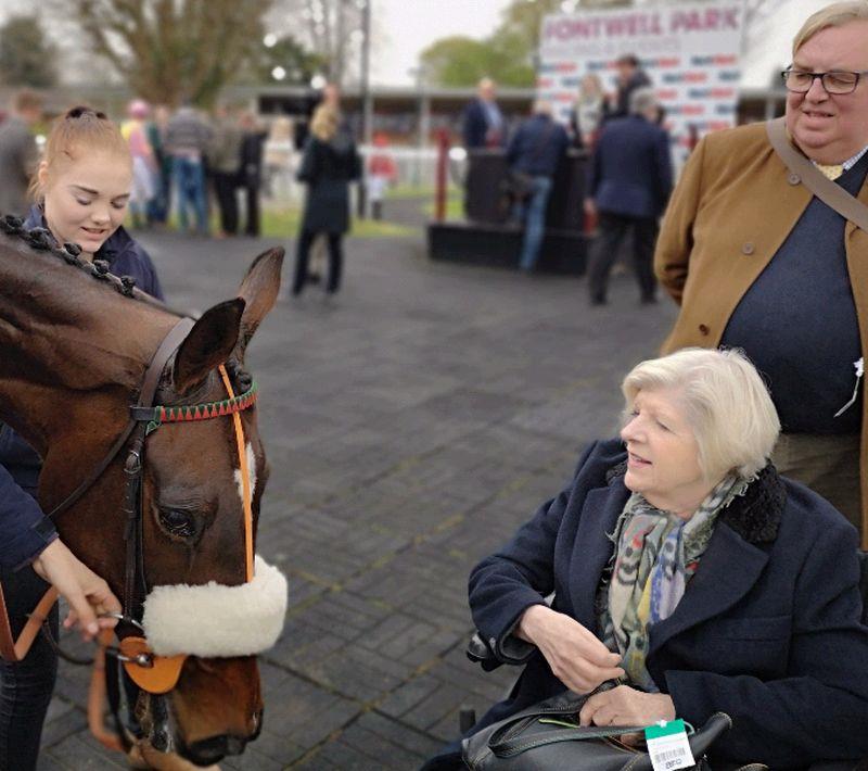 Penny Perriss with her horse Staion Master .. Tony Ashall looks on.