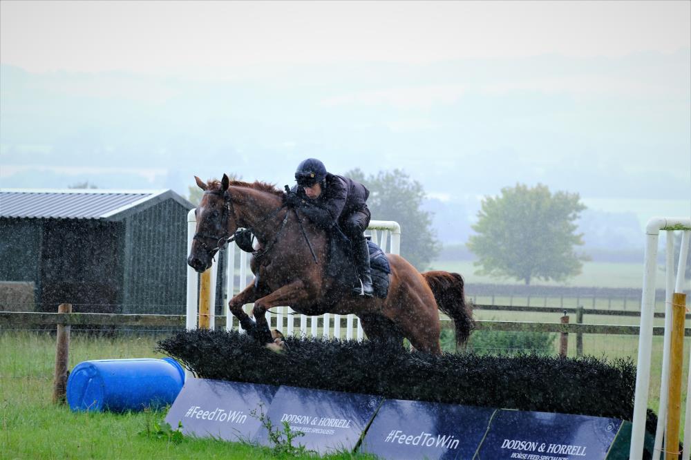 Rhosneigr and David Bass jumping in the rain