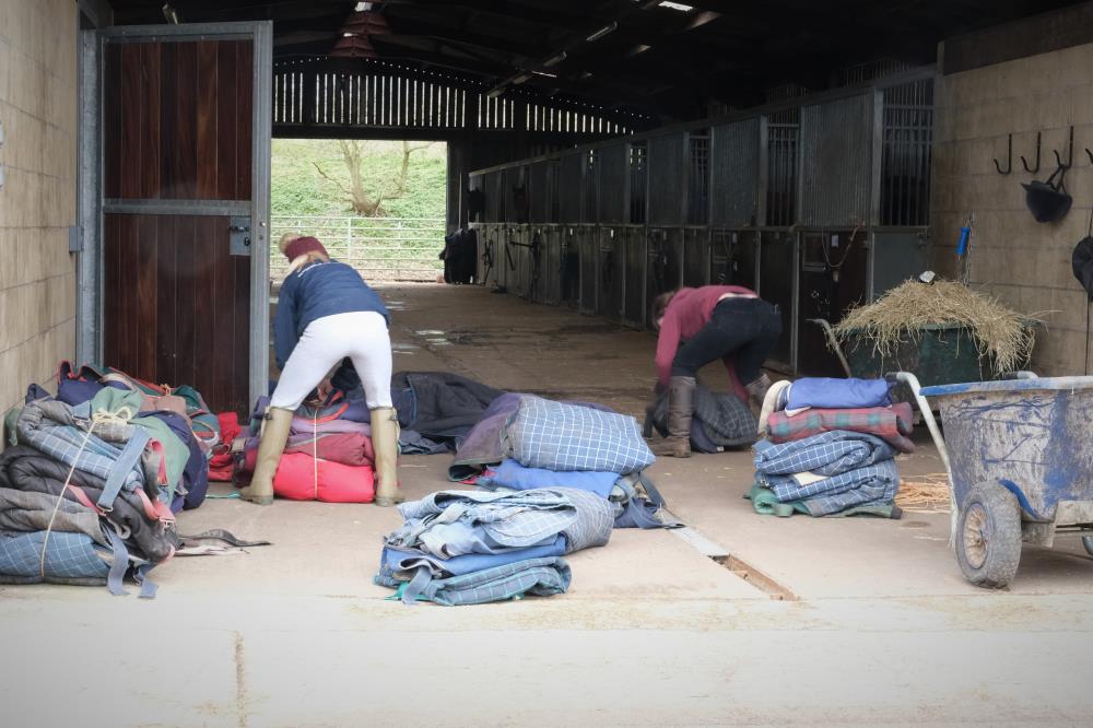 Now the rugs have come off the horses they need checking, packing and set to the cleaners..