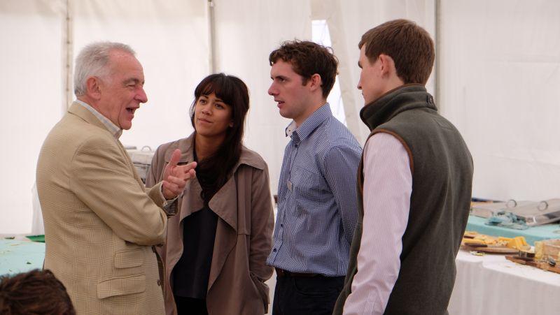John Perriss discussing politics with Tor de Giles, David Bass and Tom Bellamy