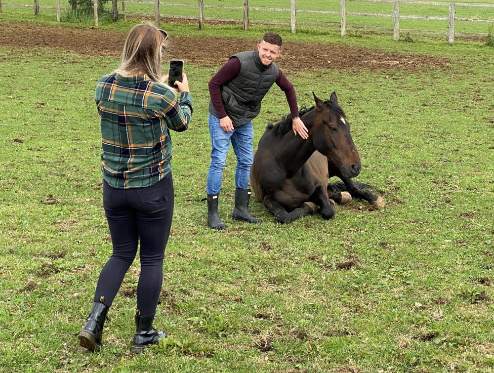 Charlotte filming Matt with his KBRP horse Donnie Brasco