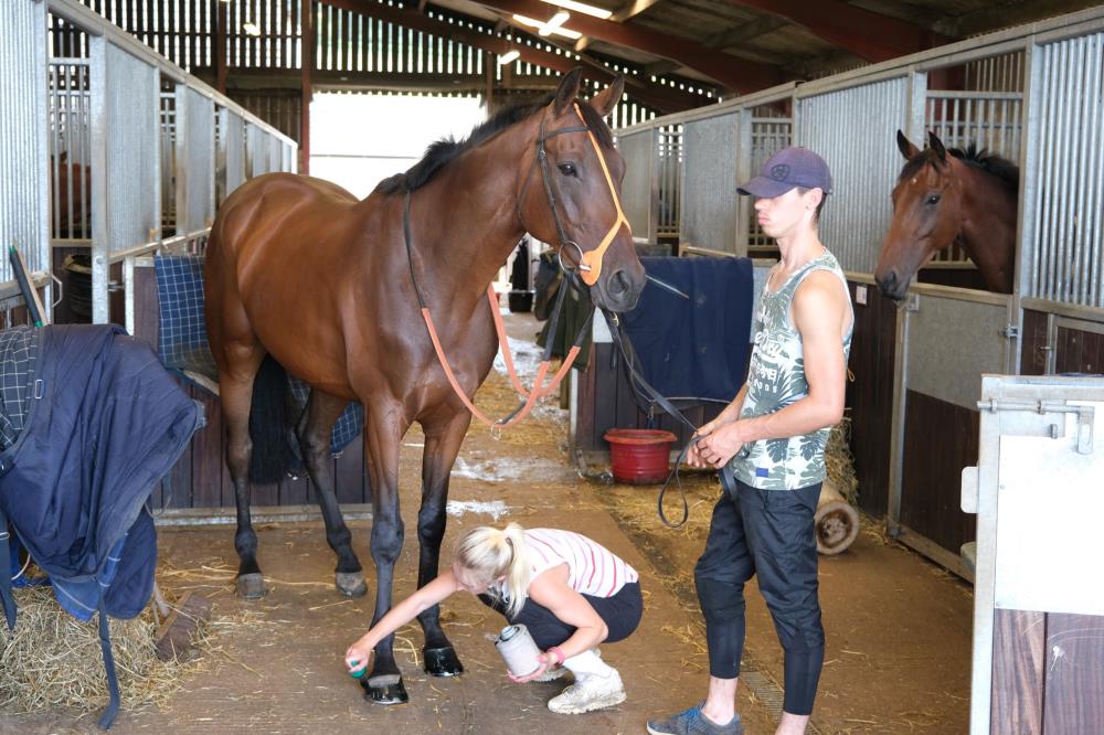 Chazza having his toes painted for his photograph