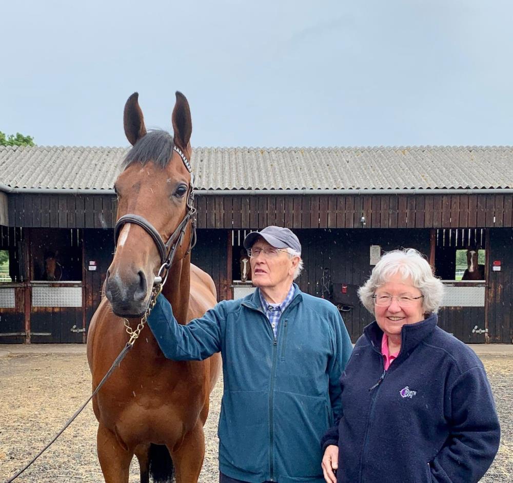 John and Pat Lee with their latest KBRP horse.. The Walk In The Park 3 year old gelding.. one share left..
