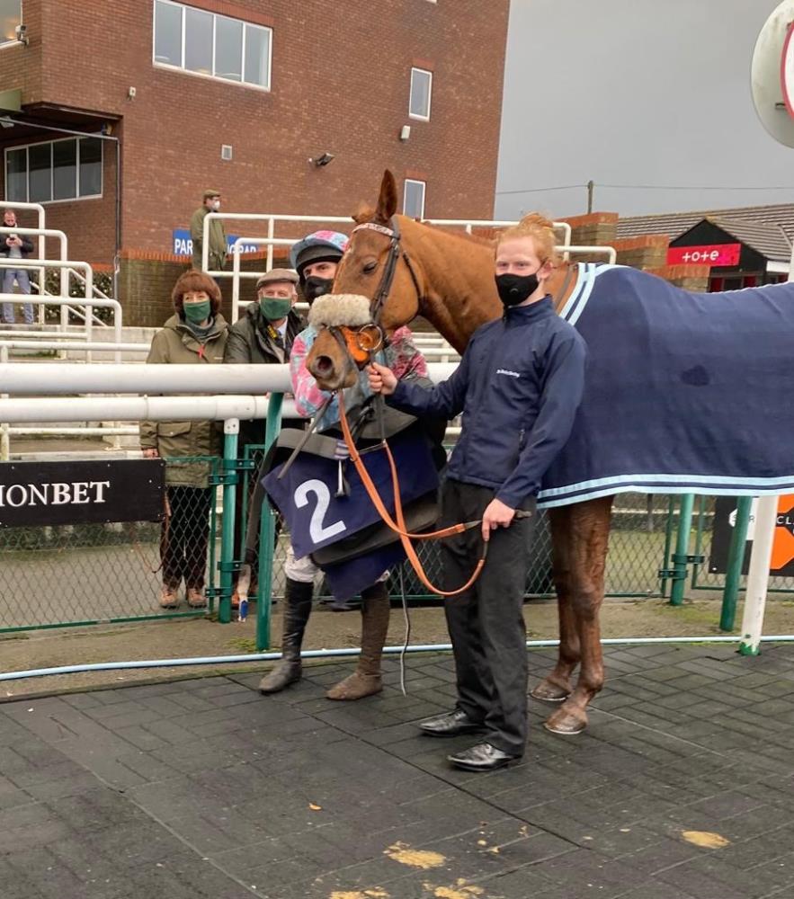 In the winners enclosure with his lad Will and wners John and Veronica Full ..