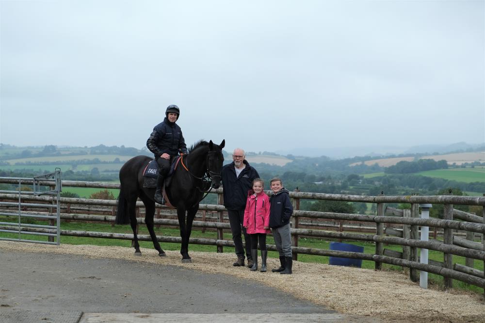 Norman with his horse Samatian and his grandchildren Gracie and Charlie
