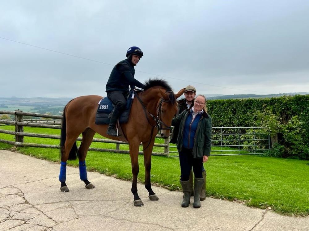 Calum Carter and his partner Vanessa with his new KBRS horse Isle of Gold