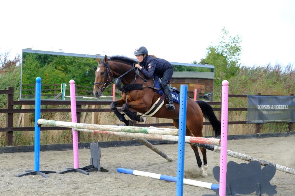 El Presente having a practice jump with Laura Coillett ahead of his run at Chepstow this Saturday..