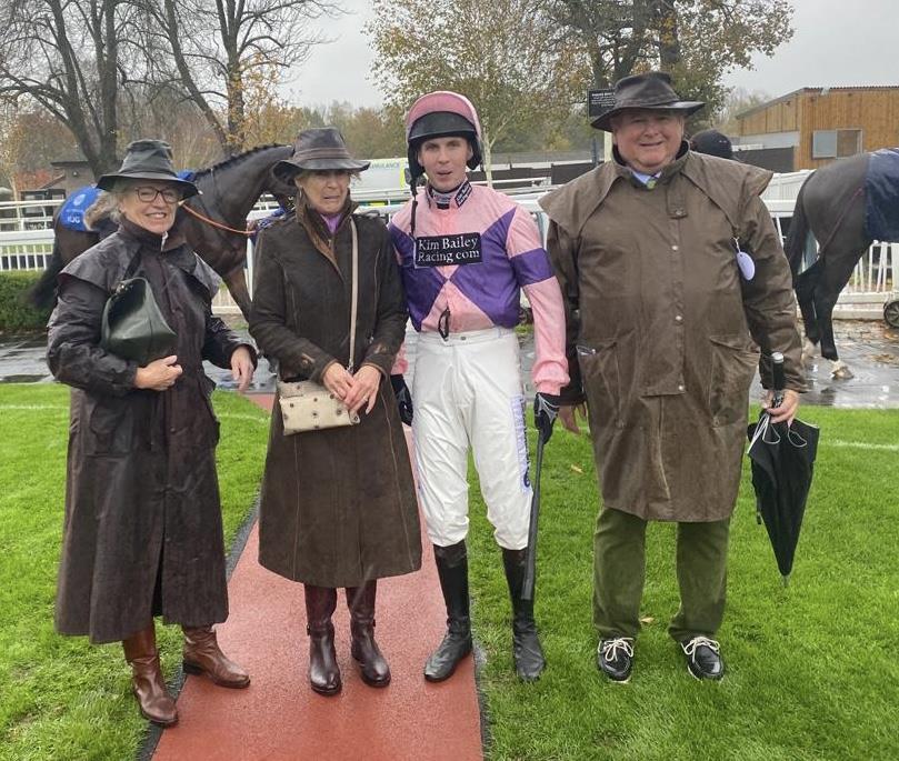 Kathrine Todd and Liz and Keith Ellis looking very wet before Thruthelookinglass's race