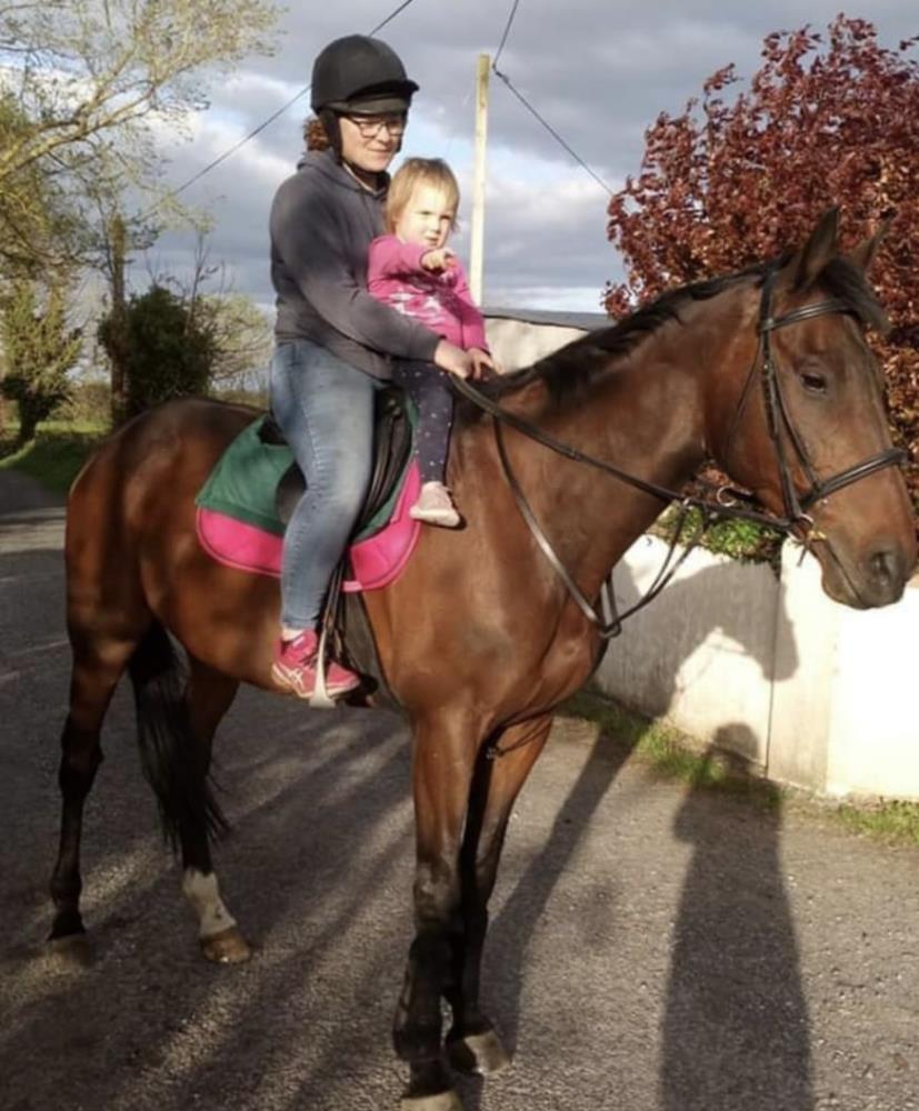 Kayleigh and her daughter Molly enjoying the company of Harry Topper