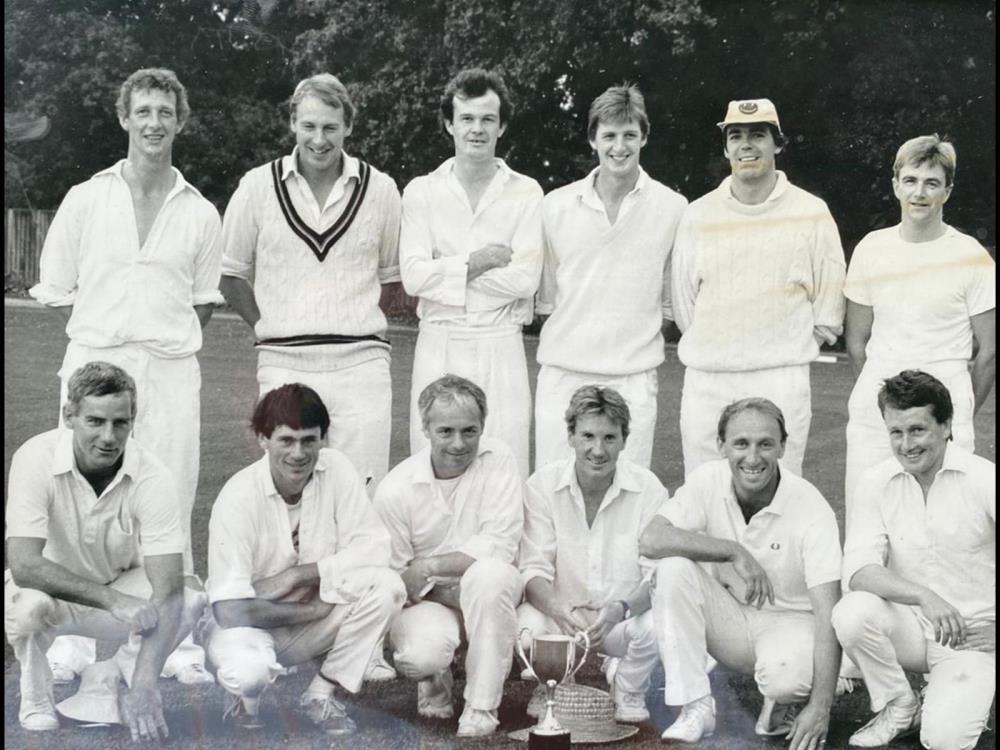The Lambourn Cricket Team.. David Arbuthnot, KCB, Chris Bealby, Eddie Hales, Kim Brassey and Willie Muir… squatting from right to left Bobby McKeown,Oliver Sherwood, Charlie Mann, Steve Knight, Simon McNeill and Guy Roberts  