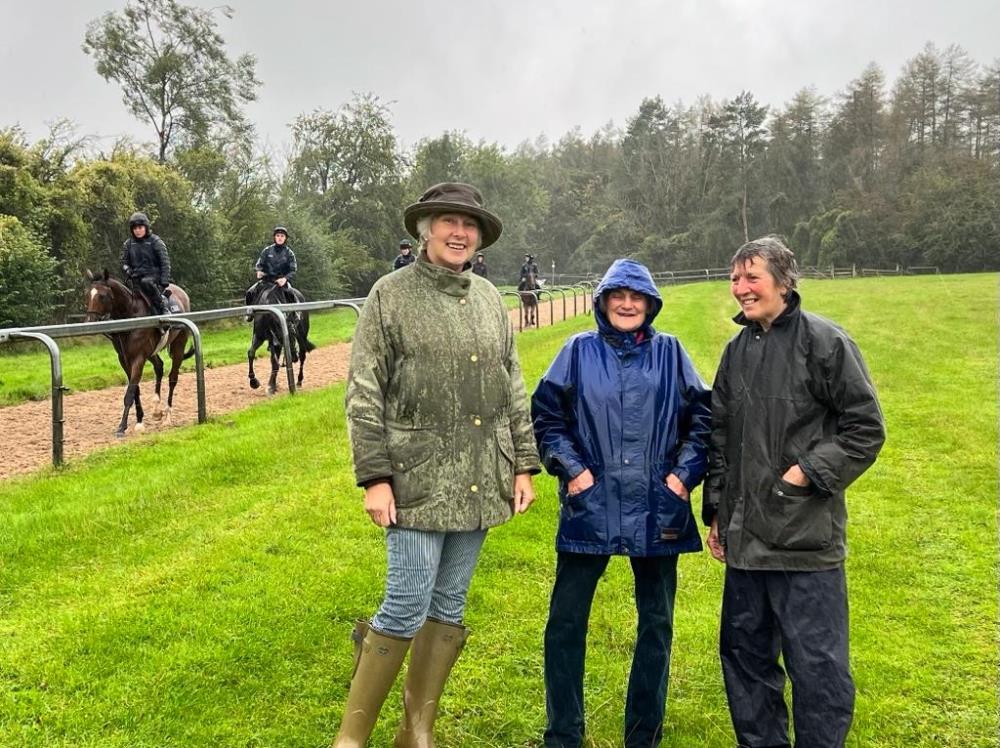Marion, Ross and Joy enjoying a wet morning on the gallops?
