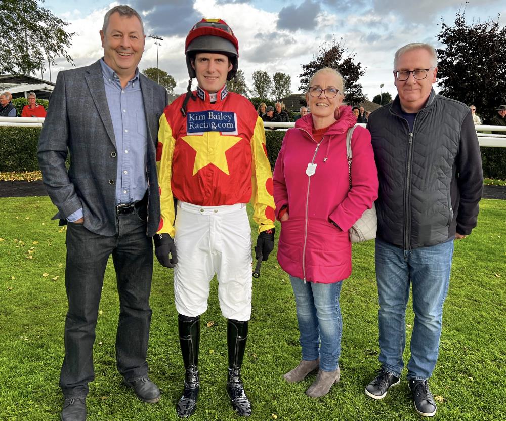 Phil Andrews with his jockey DB and Colette and Kevin McGrath