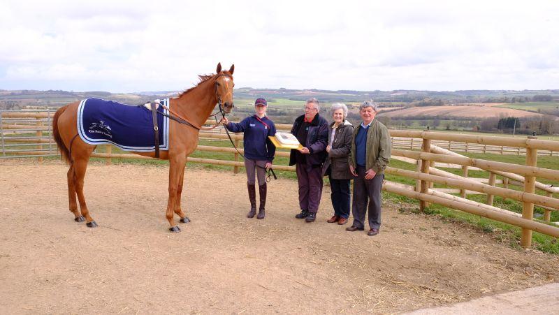 Fizzy Dancer with his owners .. Roland Fox presenting his friends Maurice and Pimm Greenaway with a 50th wedding anniversary cake
