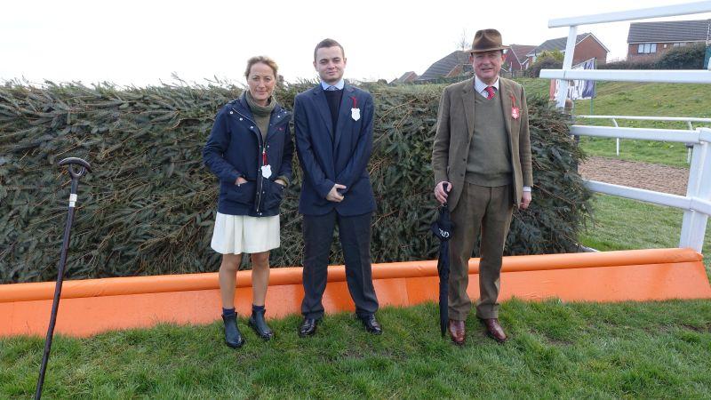 Clare in some very atractive shoes borrowed from Sarah Hobbs.. Toby and Johnny Ruck Keene at the third fence.