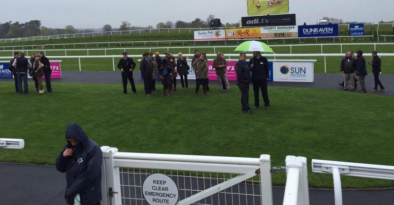 Some of Ascotdeux Nellerie's owners standing in the paddock at Cheltenham last night