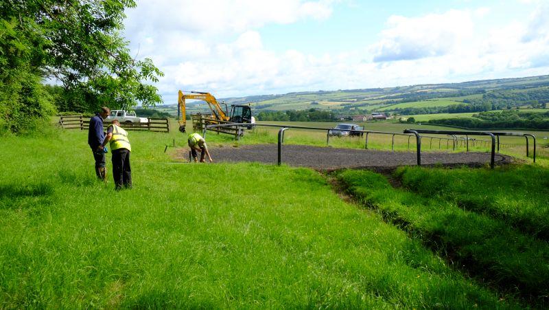 Pegging out the new turning circle at the top of our all weather gallop
