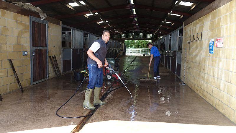 Mat has his turn on steam cleaning the barns floors