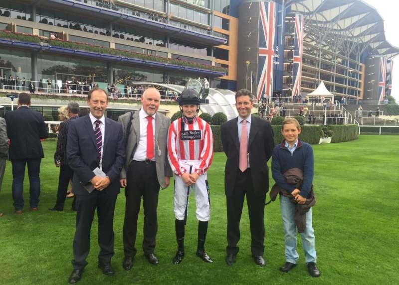 Peter Kerr, Norman Carter jockey Joshua Bryan, Richard Chugg and Archie Bailey in the paddock at Ascot yesterday before Sunblazer's race.